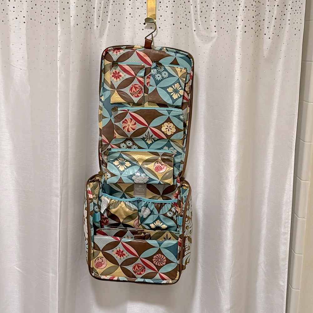 NWOT Multi-functional vinyl travel organizer by AMY BUTLER